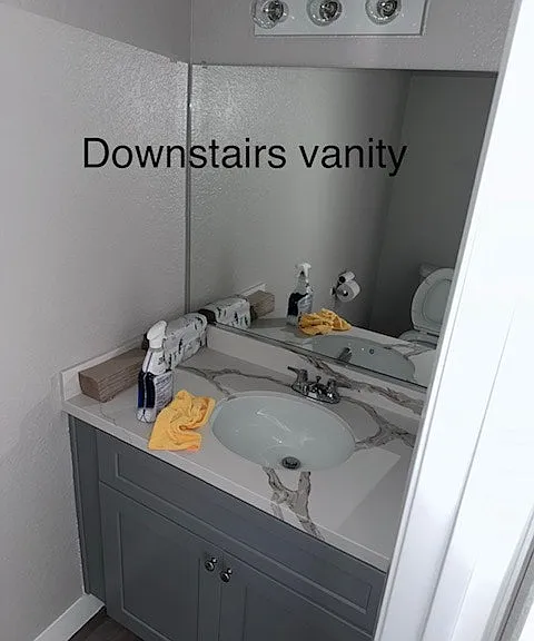 "Convenient downstairs vanity area."