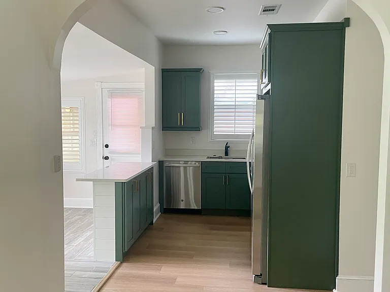 From the living room view to the kitchen.