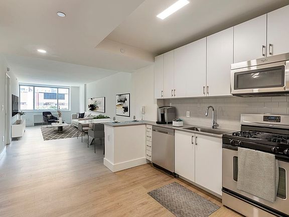 Renovated II North/South kitchen and living room with hard surface flooring