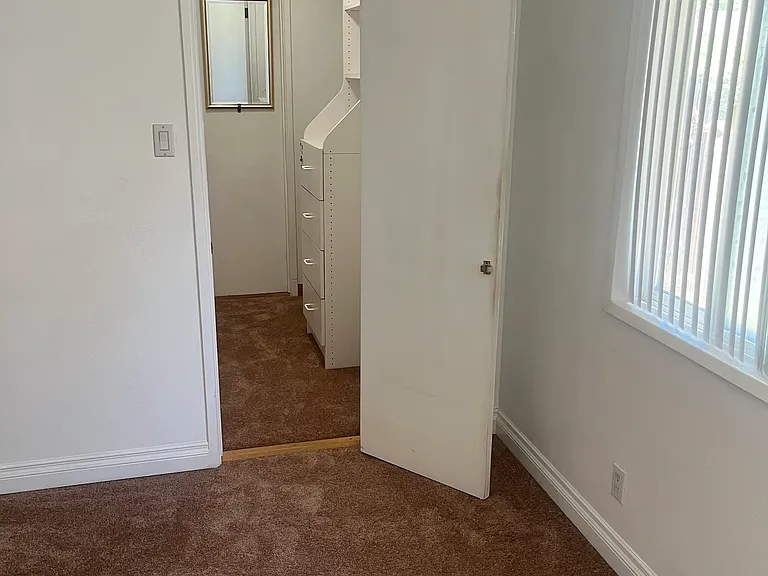 Bedroom 1 showing entrance into walk in closet