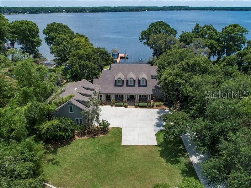 Almost an acre on Lake Tarpon.  Non - deed restricted.  2 miles to downtown Tarpon Springs.  Close to sparking gulf coast beaches, shopping, dining, schools and top medical facilities.  An easy commute to Tampa International Airport.