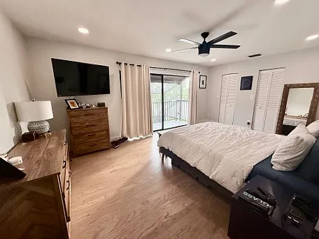 upstairs master with large walk-in closet and an ensuite bathroom