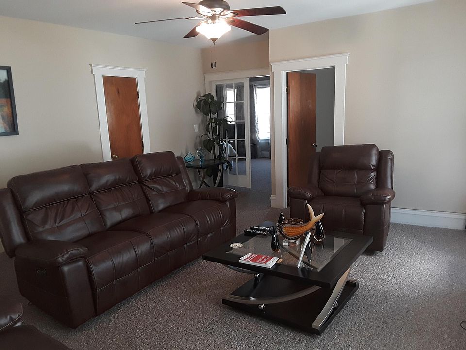 Living room space prior to new wall paint.