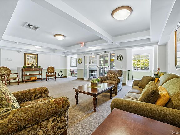 2nd image of 100 Woodcrest Lane #124