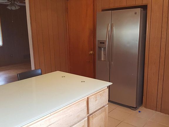 Kitchen looking through to living room