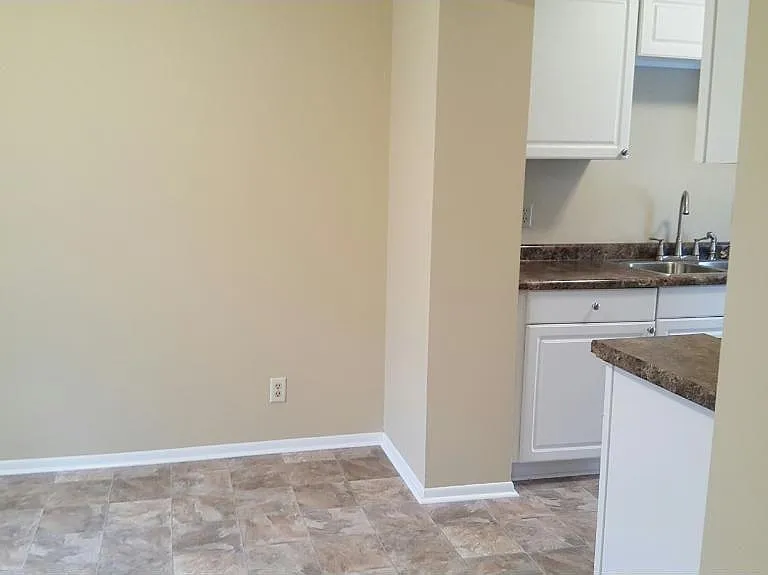 Separate dining room off the kitchen (flooring just replaced across whole main level)
