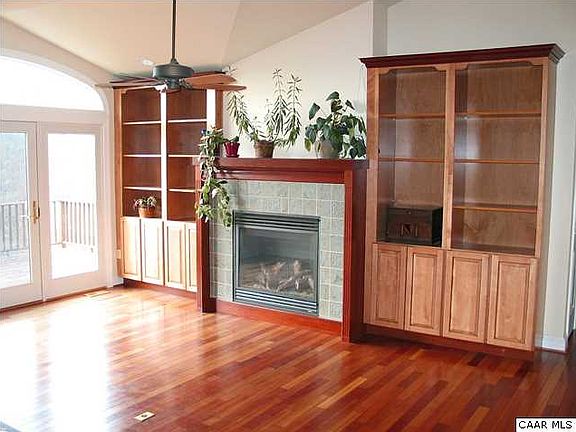 Built in bookcases flank the fireplace