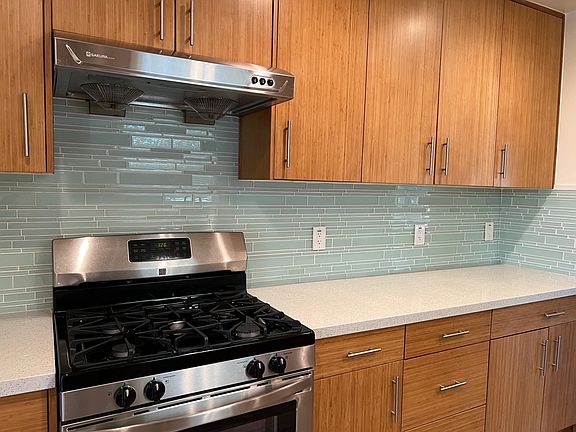 Kitchen with stainless appliance