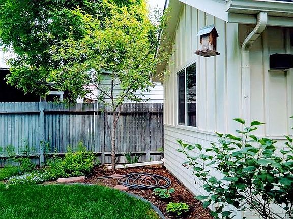Fruit trees surround the yard