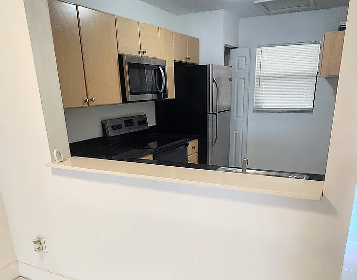 902 NE 209th St #203 — Photo 9