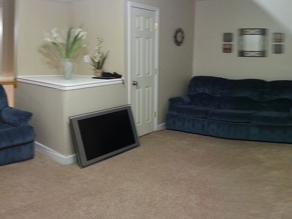 3rd floor room to the left of stairs.  Use a bonus room, arts/crafts, etc.