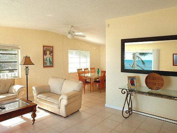 Italian leather and marble furniture accent the upstairs..