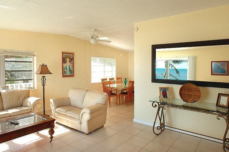 Italian leather and marble furniture accent the upstairs..