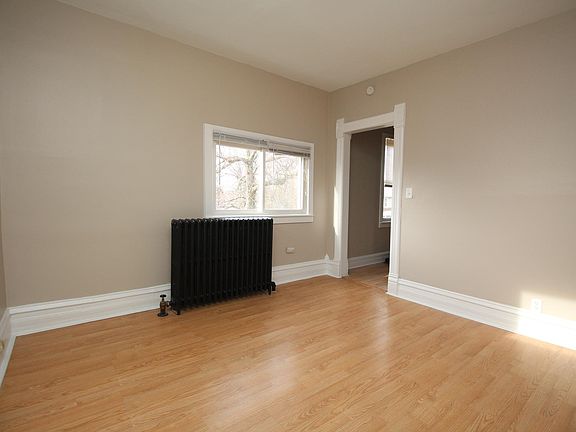 Big, bright, warm living room with streaming natural light!