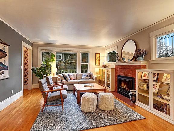Living room with newly installed gas fireplace insert.