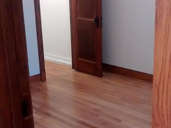 First bedroom with walk-in lighted closet 