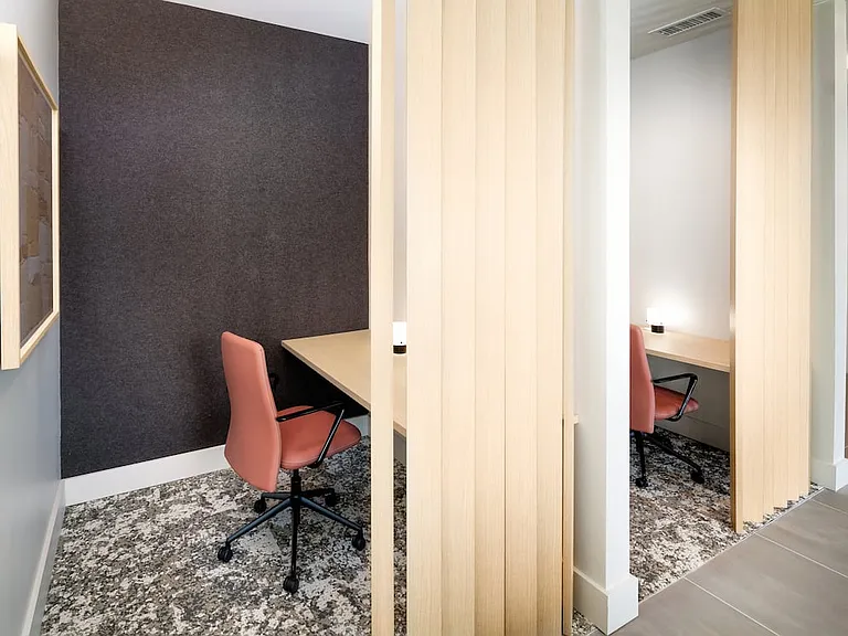 Cowork lounge with private work pods