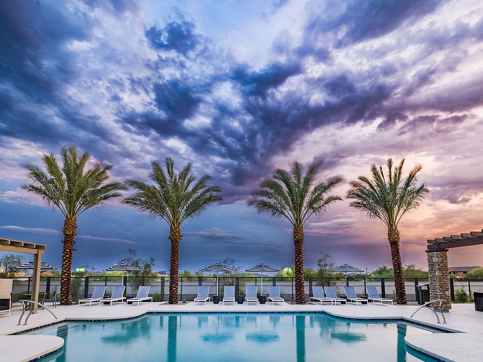 Escape the heat in style! Our resort-style pool with a covered pergola is your new favorite summer spot.
