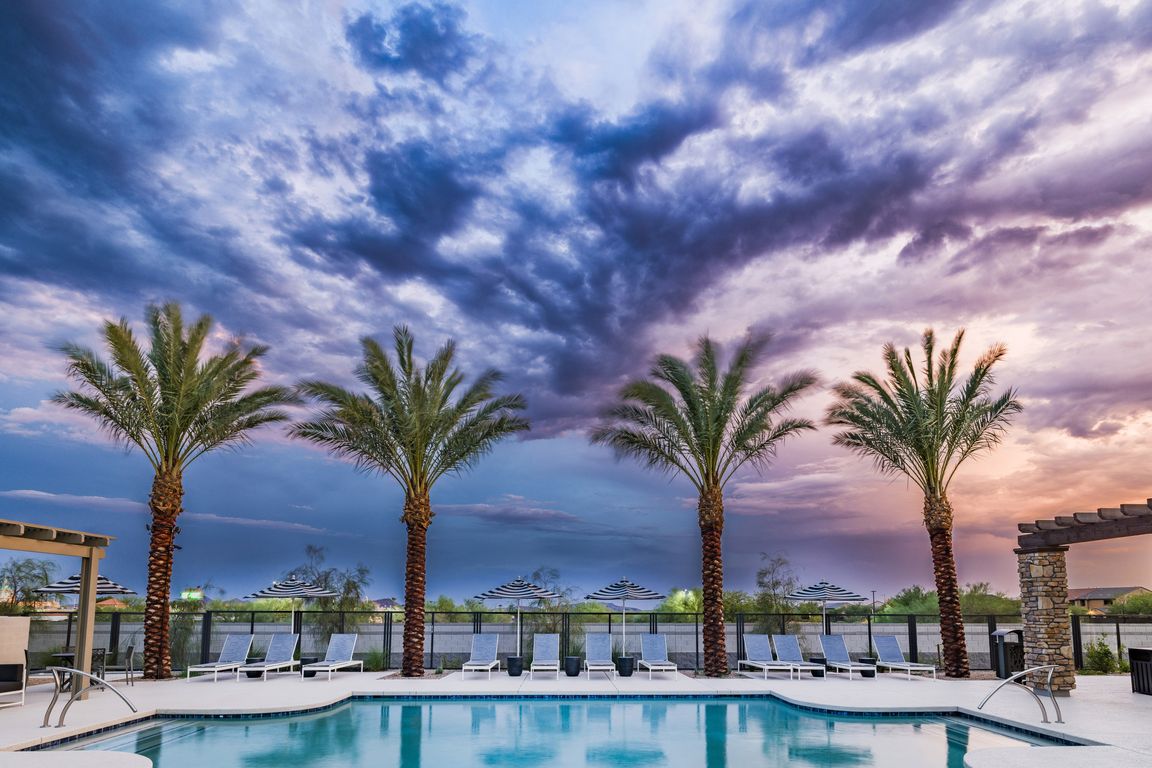 Escape the heat in style! Our resort-style pool with a covered pergola is your new favorite summer spot.