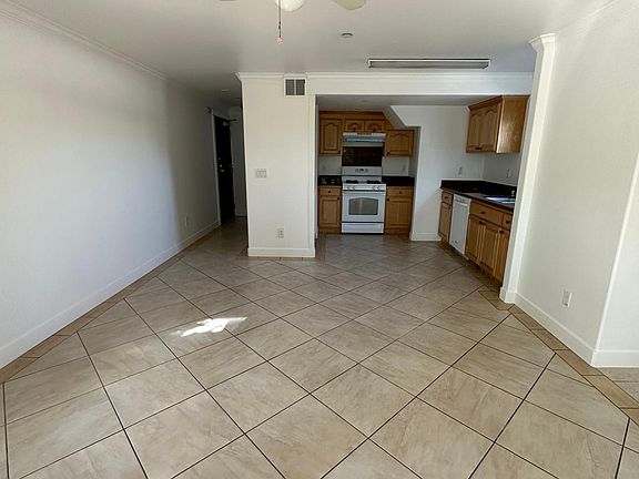 Open floor plan-Living room and Kitchen, Eating area , with sliding door access to patio.