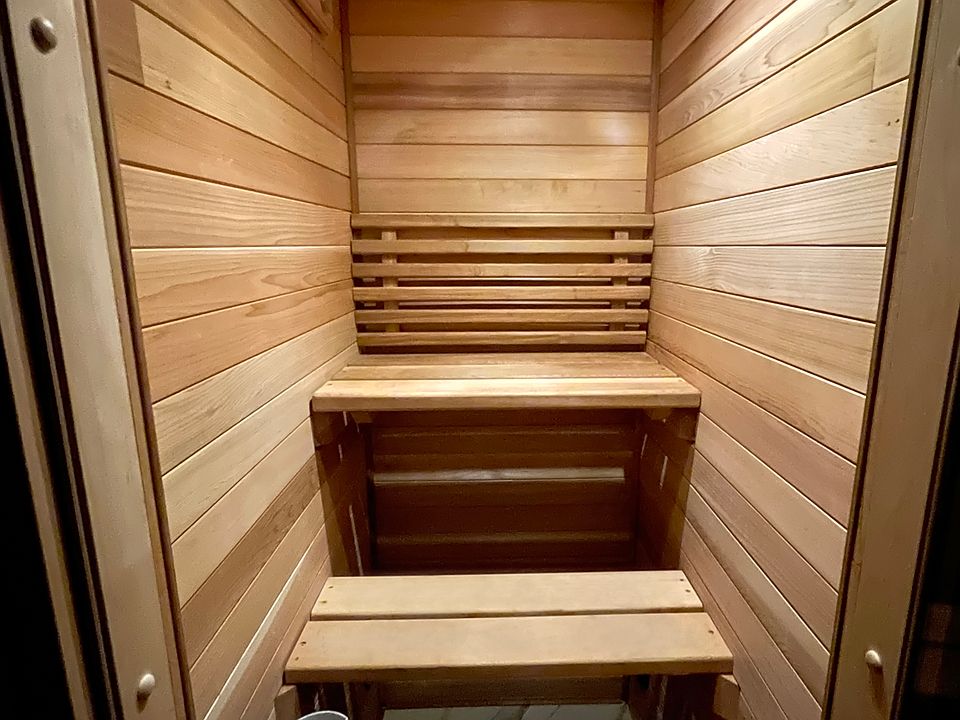 3 bench personal sauna. Swedish designed ventilation. Red cedar. Recently upgraded ceramic stones, custom cut linen bench covers, and sauna hat (not pictured).