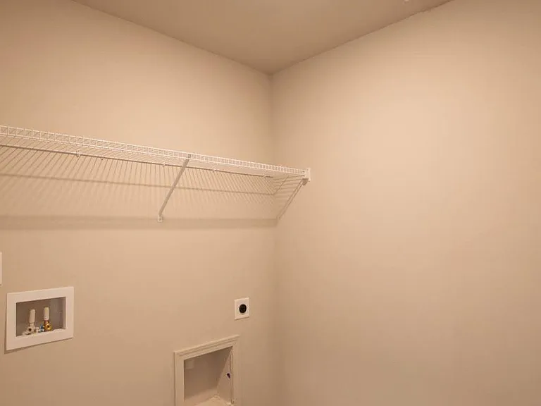 Laundry room with new Samsung washer, Dryer.