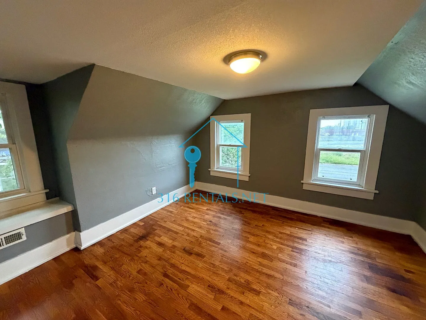 $899 | 2BR Newton Home w/ Hardwood Floors, Fireplace & Fenced Yard | Pets OK — Photo 2