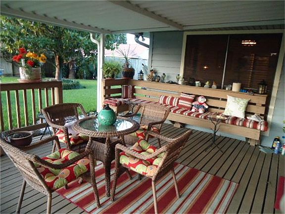 Covered patio, great for entertaining or just relaxing, private backyard with full sprinkler system.