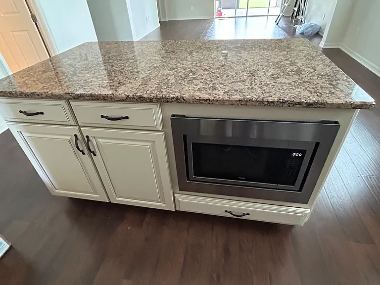 Kitchen island with built in microwave