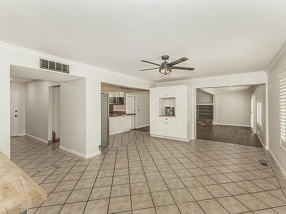 5th image of 6038 N Roosevelt Ave