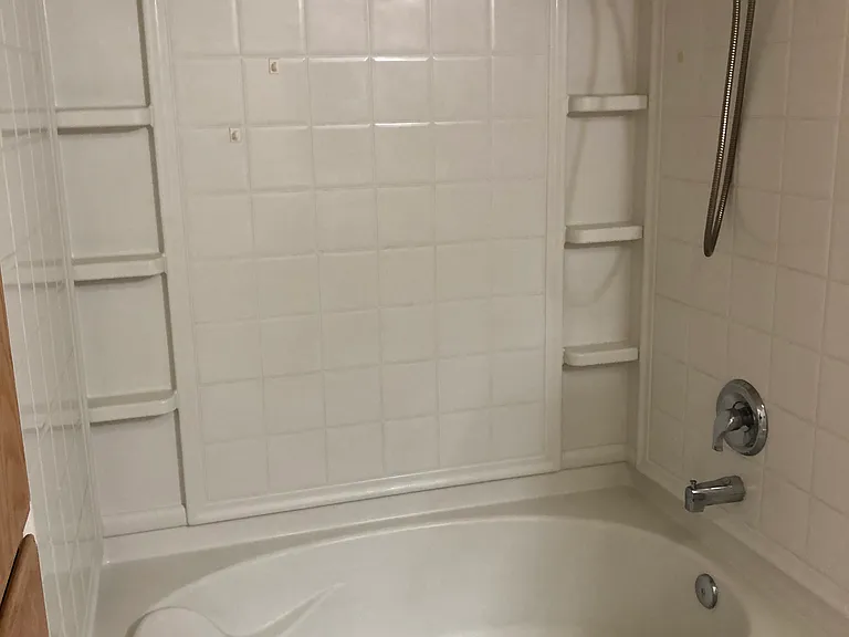 Master bathroom oversized huge bath tub with shower. Newer fixtures.