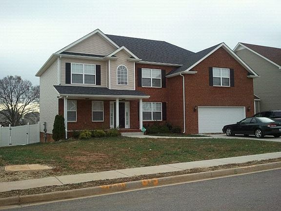 Front with side view of fence.