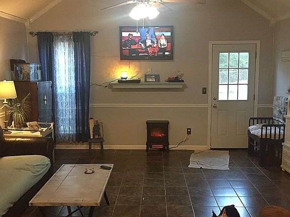 Living room with vaulted cei