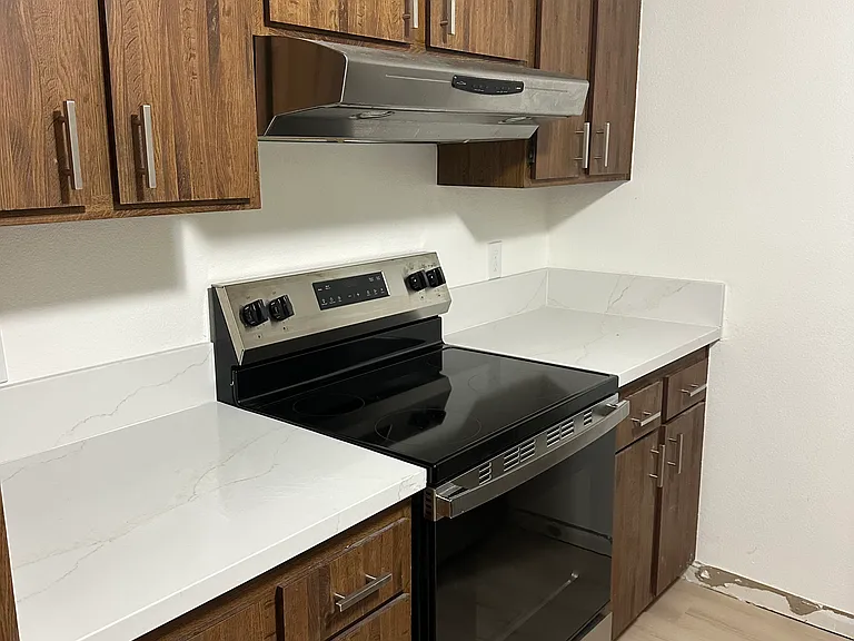 New range, countertops, and flooring!