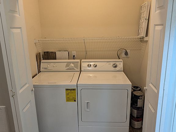 Laundry room. Speed Queen washer and dryer.