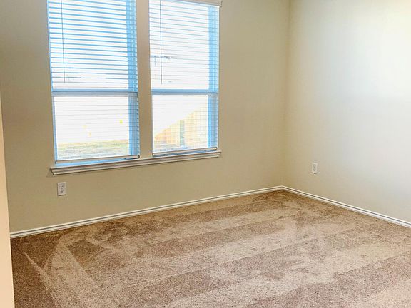 Master's Bedroom at the back of the house for privacy. With view of the over-sized backyard.