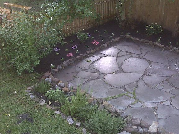 view of patio from deck