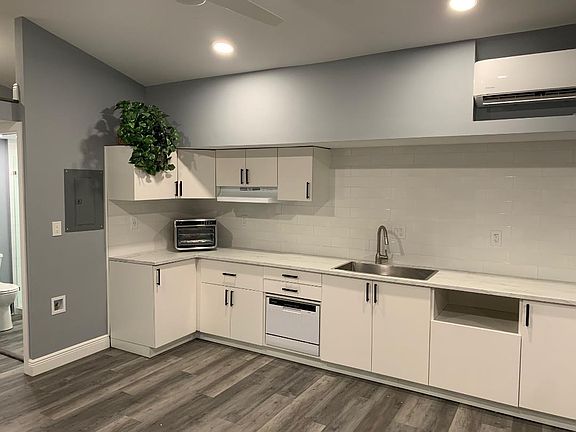 Ample kitchen with plenty of counter space. Refrigerator will be included. Huge sink. Automatic Dishwasher. Ninja Oven and induction cooktop will be included.