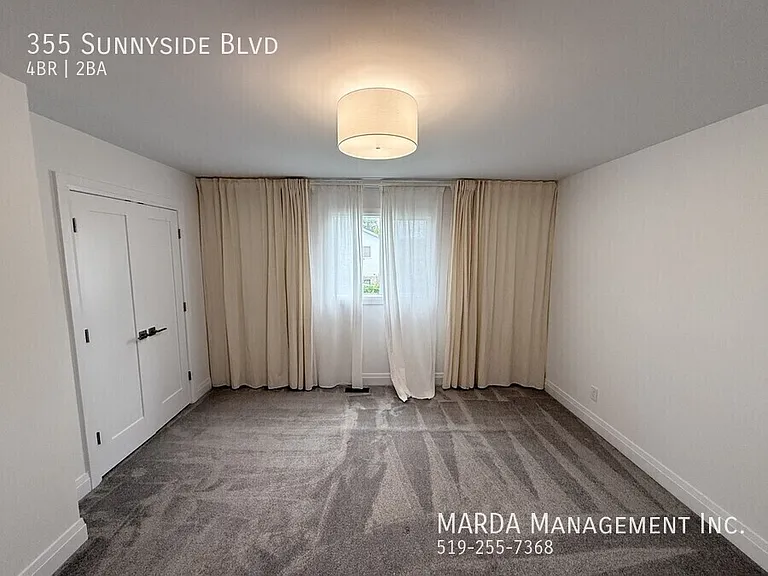 355 Sunnyside Blvd — Photo 35