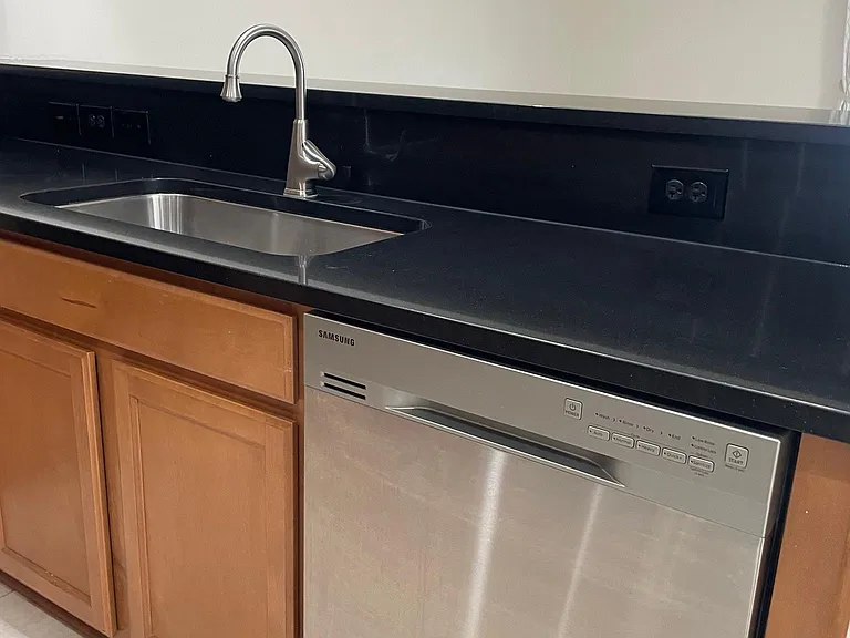 Well placed stainless steel dishwasher
