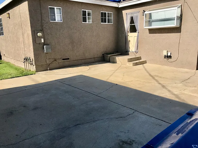 widened driveway & patio. Plenty of room for BBQ and patio furniture.