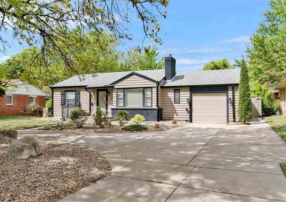 Circle drive and plenty of parking for guests in front.