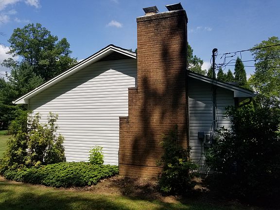 Brick chimney on S side