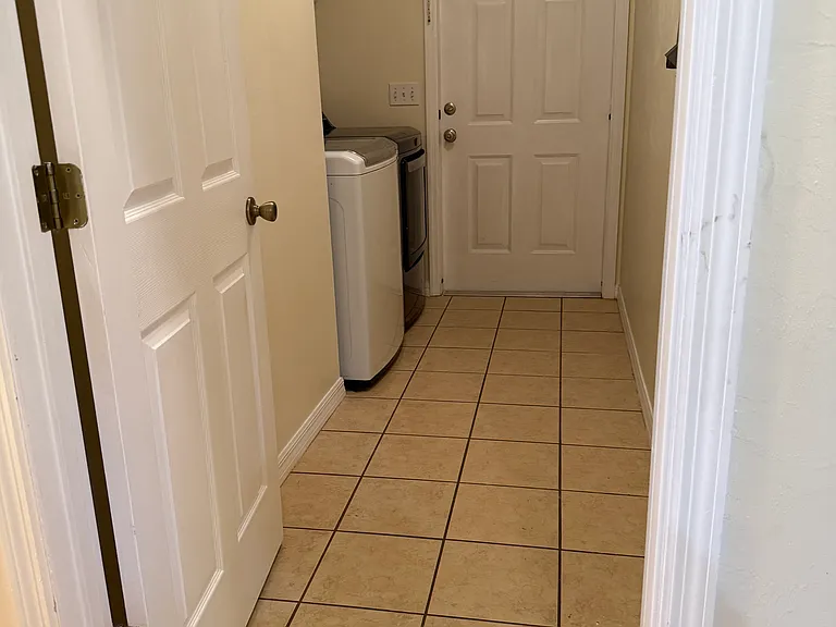 HE washer and dryer in laundry room