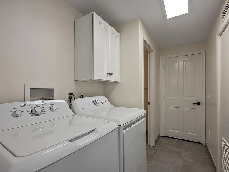 First Floor Laundry Room with Full Size Washer and Dryer