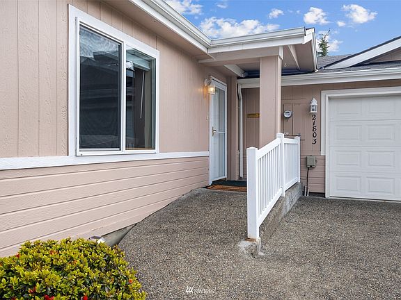 Covered front entry with no stairs. 