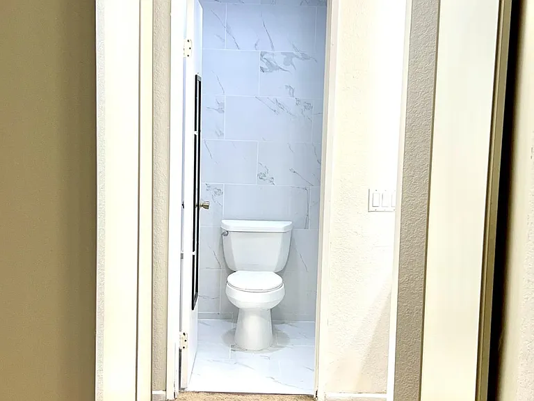 Outside of Bathroom-1, Two large closets left and right sides.