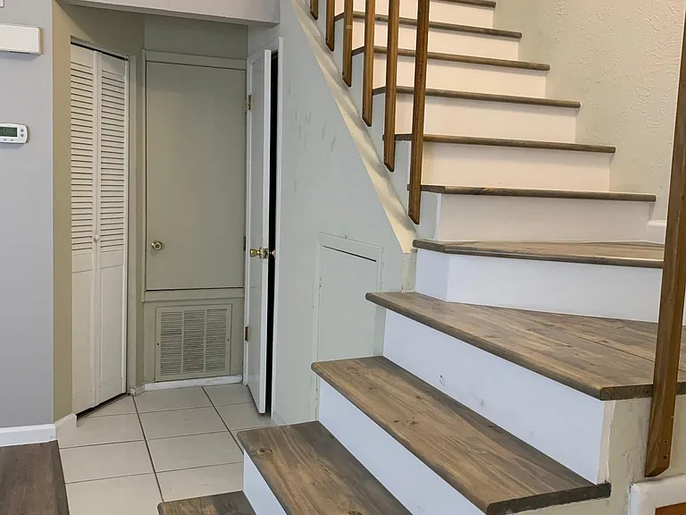 Elegant, custom real wood staircase.