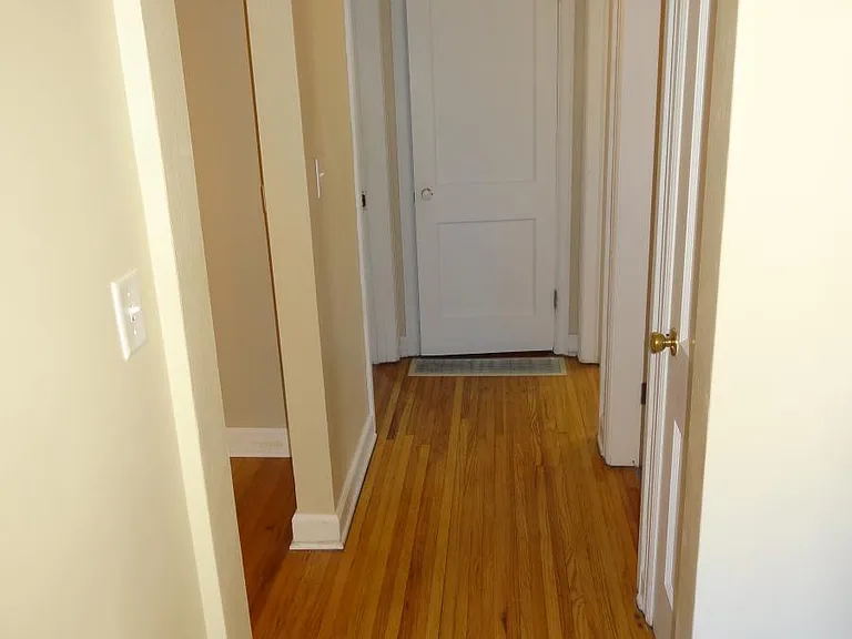 Hall- living room on left, bath on right, master far left, 2