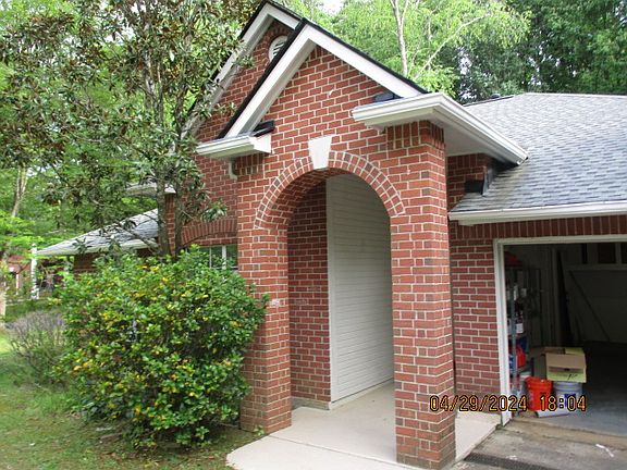 Covered front entry with arch